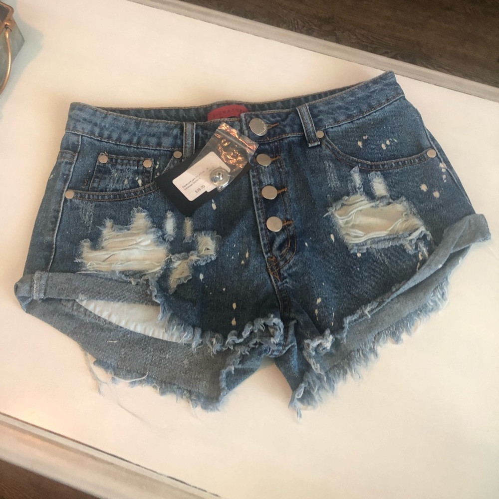 High waisted distressed shorts